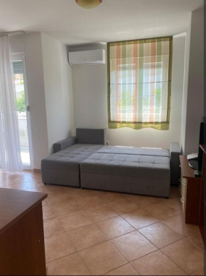 Double bed in studio, by the beach near Split